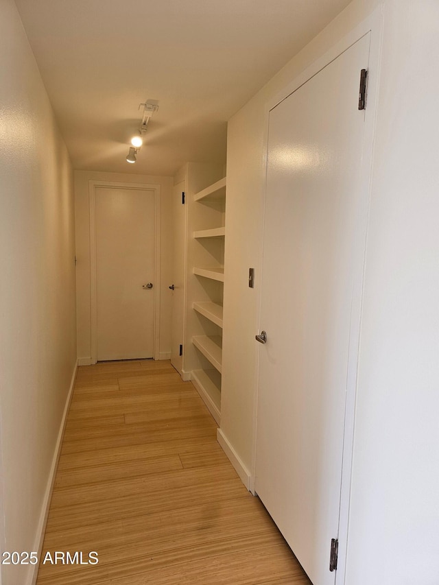 hallway featuring light wood-type flooring