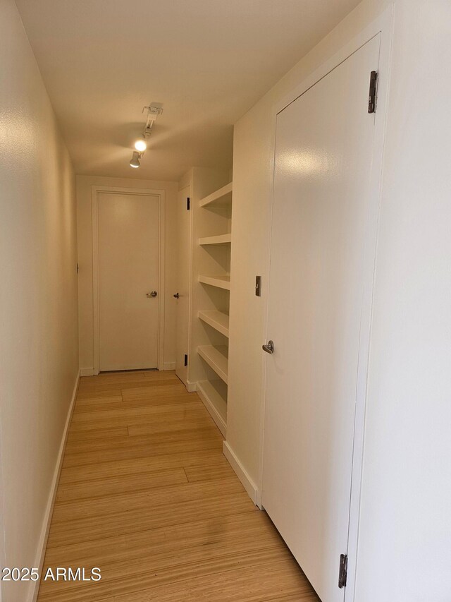 corridor featuring light wood-type flooring