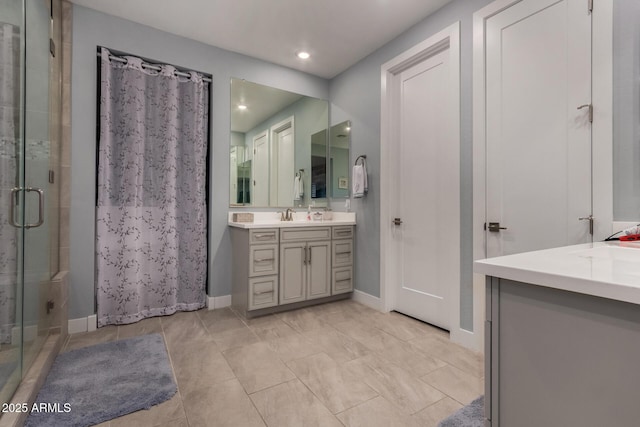 8741 N 185th Ave, Waddell, AZ 85355 - full bathroom featuring a stall shower, vanity, and recessed lighting