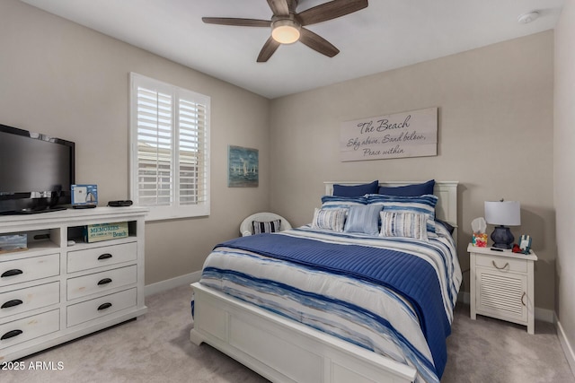 8741 N 185th Ave, Waddell, AZ 85355 - bedroom with light colored carpet and a ceiling fan
