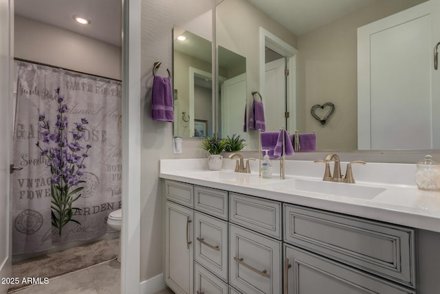 8741 N 185th Ave, Waddell, AZ 85355 - full bathroom with double vanity and a shower with curtain