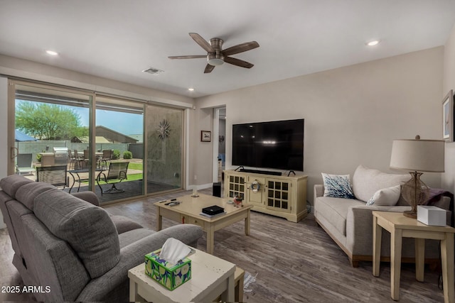 8741 N 185th Ave, Waddell, AZ 85355 - living room with a ceiling fan, wood finished floors, and recessed lighting