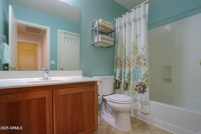 full bathroom featuring tile patterned flooring, vanity, shower / bath combo, and toilet