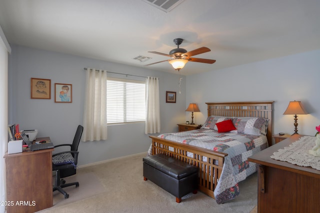 bedroom with ceiling fan and light colored carpet