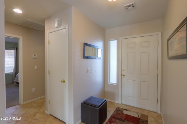 view of tiled foyer entrance