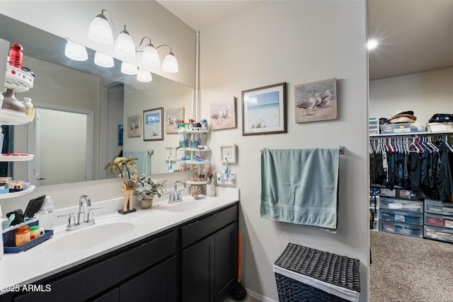 18711 W Farmer Rd, Buckeye, AZ 85326 - bathroom featuring double vanity and a spacious closet