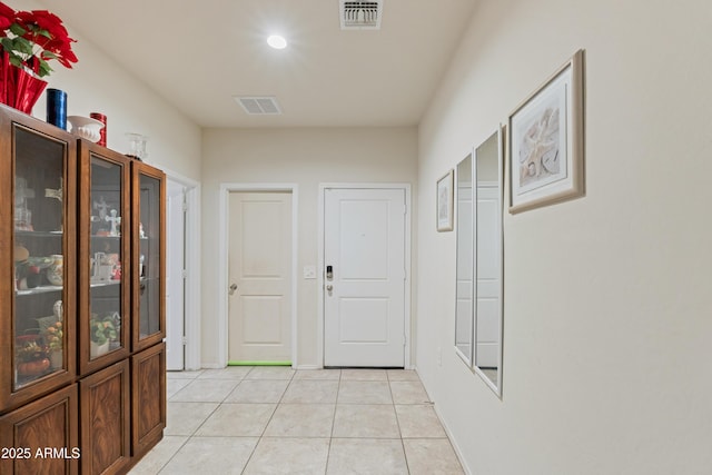 18711 W Farmer Rd, Buckeye, AZ 85326 - corridor with light tile patterned floors, baseboards, and recessed lighting