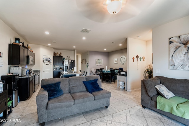 18711 W Farmer Rd, Buckeye, AZ 85326 - living room with recessed lighting and light tile patterned floors