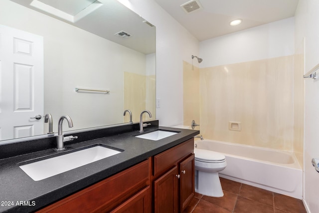 full bathroom featuring toilet, vanity, bathing tub / shower combination, and tile patterned floors