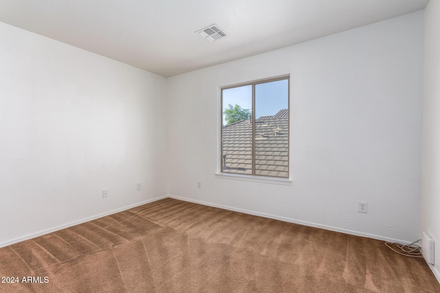 unfurnished room with carpet