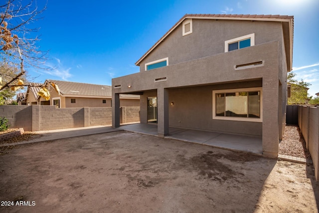 back of house featuring a patio area