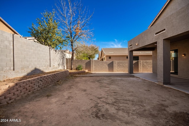 view of yard with a patio area