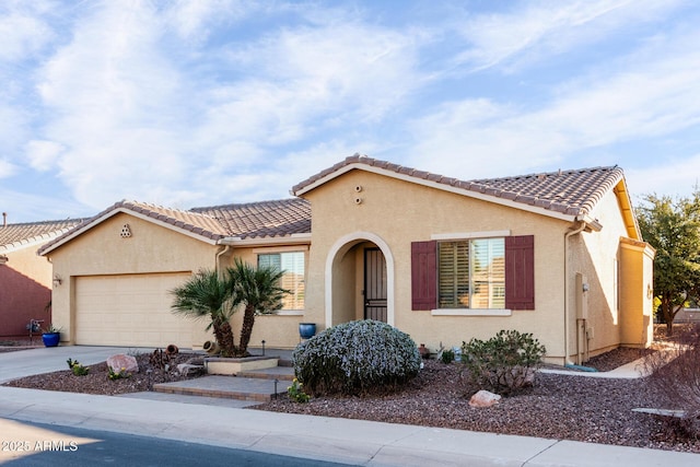 view of front of property featuring a garage