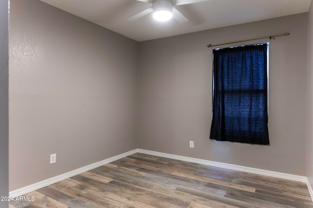 unfurnished room featuring ceiling fan and hardwood / wood-style flooring