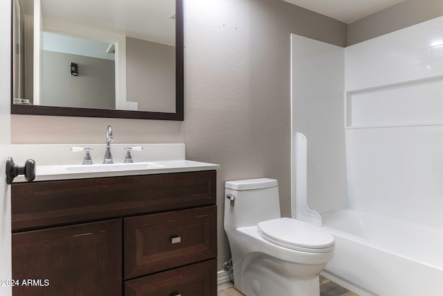 full bathroom featuring vanity, toilet, and shower / washtub combination