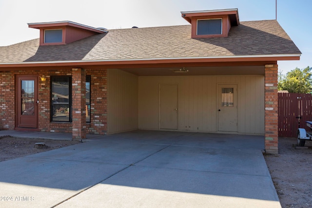 view of front of property with a carport