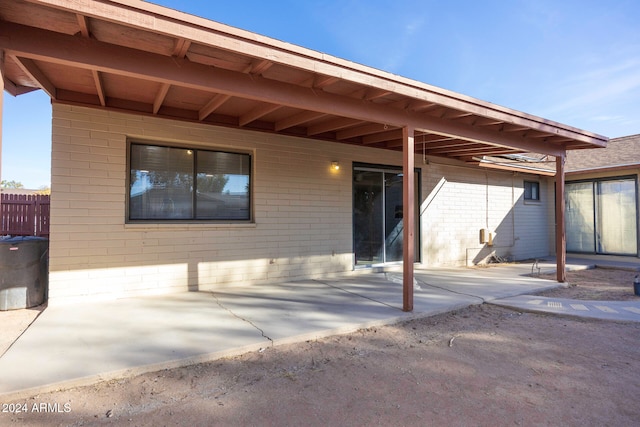 rear view of house featuring a patio area