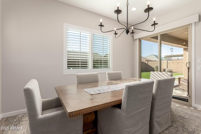 dining area with a notable chandelier