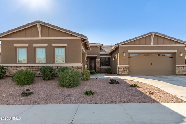 view of front of property with a garage