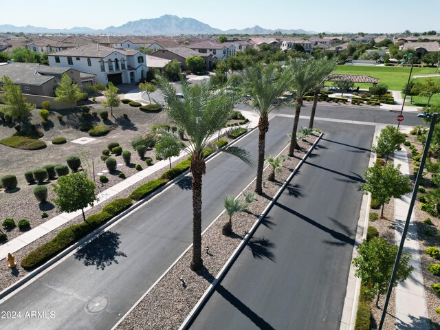 birds eye view of property featuring a mountain view