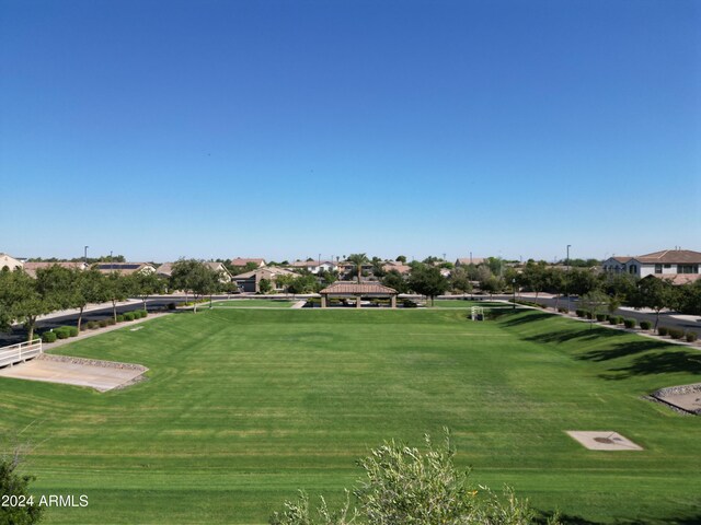 surrounding community featuring a lawn and a gazebo