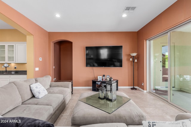 living room featuring light tile patterned flooring