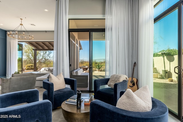 interior space with a water view and an inviting chandelier