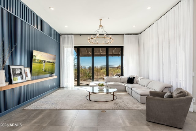 living room with an inviting chandelier