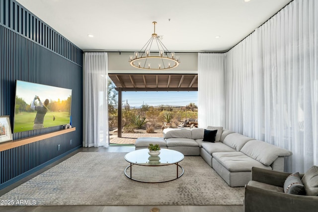 living room with an inviting chandelier