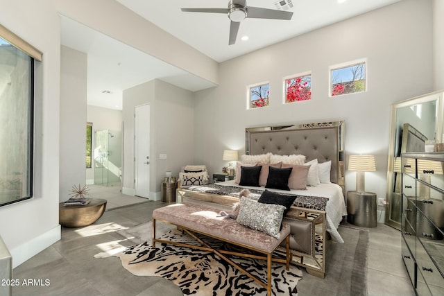 bedroom with multiple windows and ceiling fan