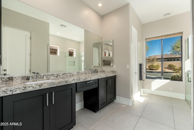 bathroom featuring vanity and tile patterned floors