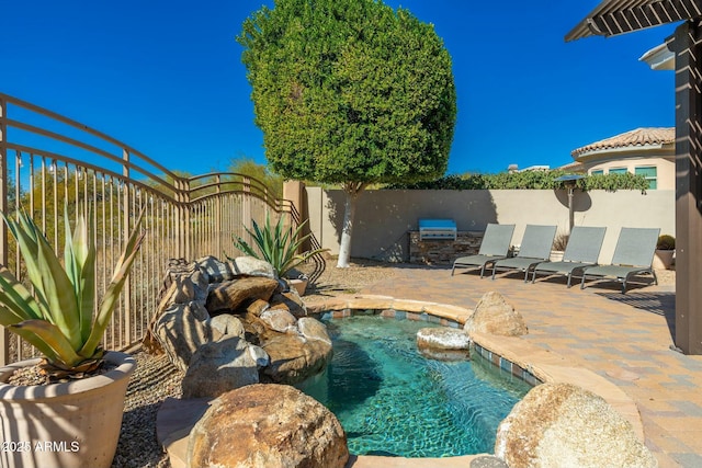 view of pool with a patio area