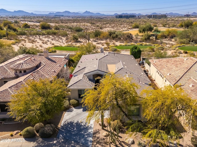 drone / aerial view featuring a mountain view