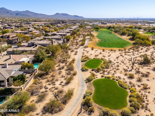 birds eye view of property featuring a mountain view