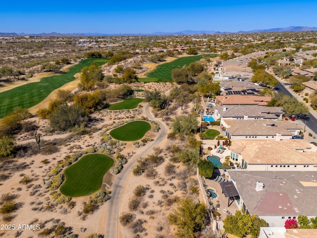 birds eye view of property with a mountain view