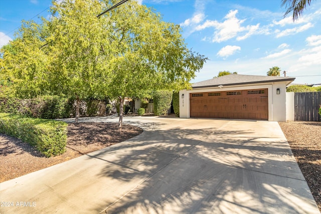 view of front of property with a garage