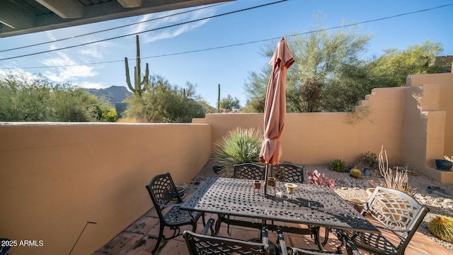 view of patio with a mountain view