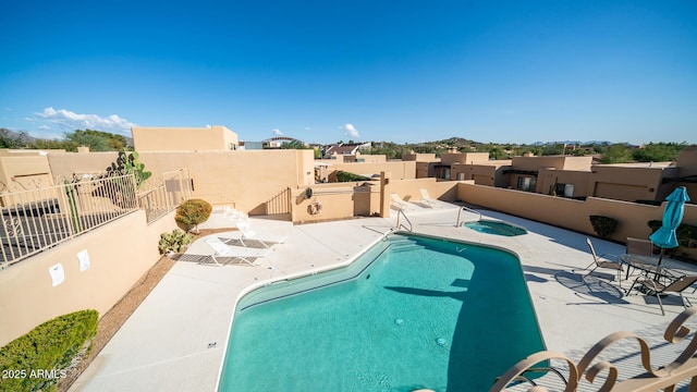 view of pool with a patio