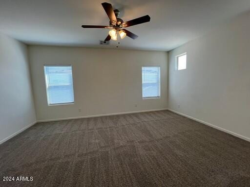 carpeted empty room with ceiling fan