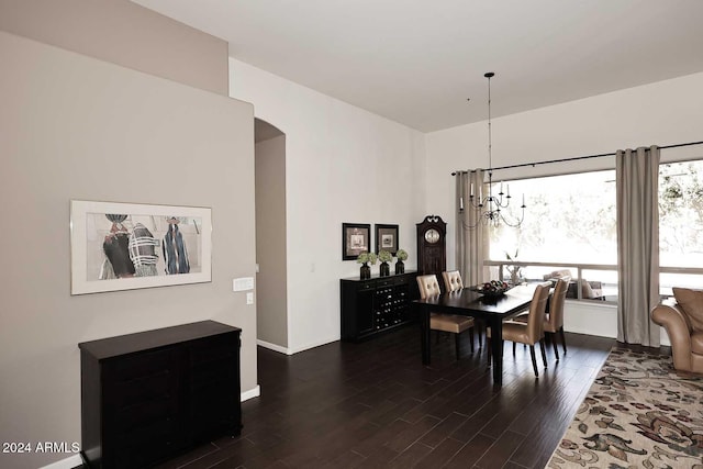 dining room with dark hardwood / wood-style flooring