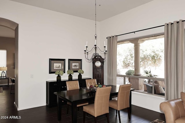 dining space featuring dark wood-type flooring