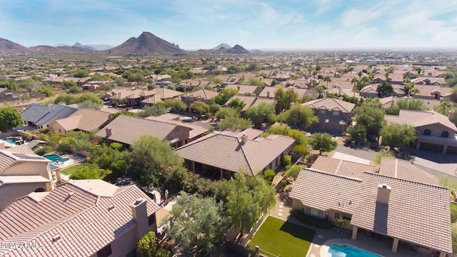 birds eye view of property featuring a mountain view