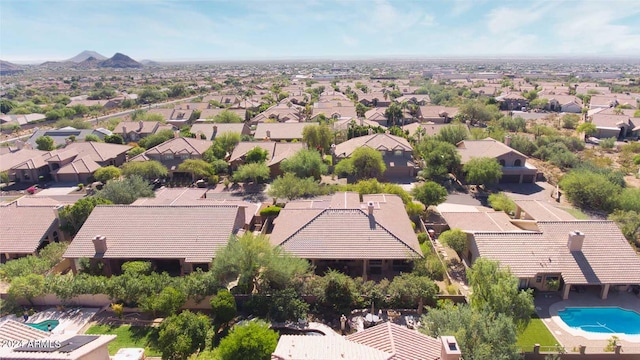 drone / aerial view featuring a mountain view