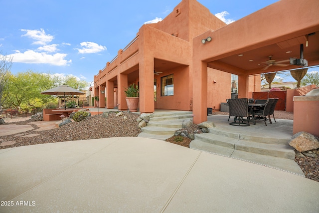 view of patio with ceiling fan