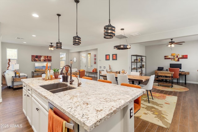 20684 W Meadowbrook Ave, Buckeye, AZ 85396 - kitchen with a ceiling fan, open floor plan, plenty of natural light, and recessed lighting