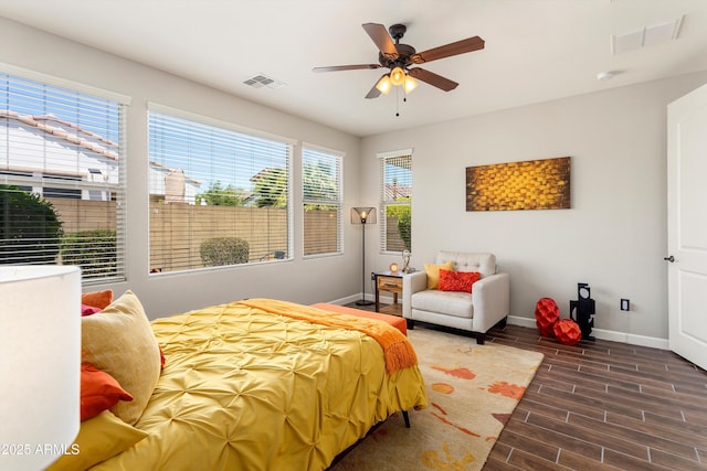 20684 W Meadowbrook Ave, Buckeye, AZ 85396 - bedroom with wood finished floors and a ceiling fan
