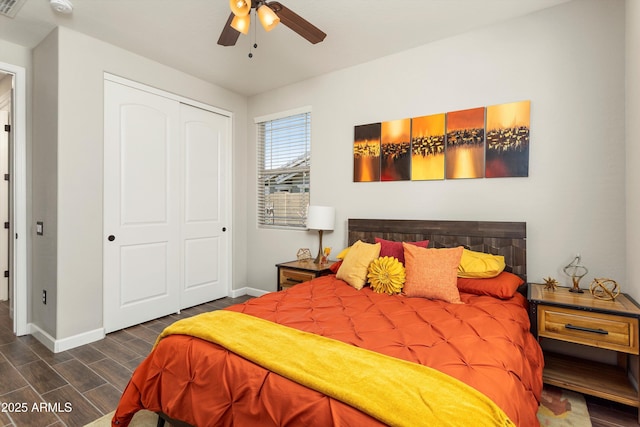 20684 W Meadowbrook Ave, Buckeye, AZ 85396 - bedroom featuring a closet, wood tiled floors, and a ceiling fan