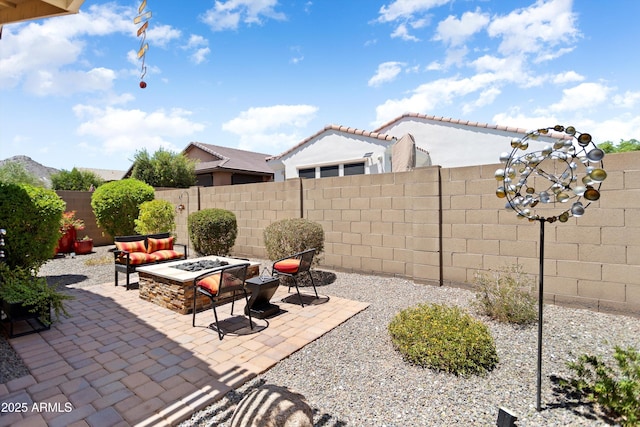 20684 W Meadowbrook Ave, Buckeye, AZ 85396 - fenced backyard with an outdoor fire pit and a patio