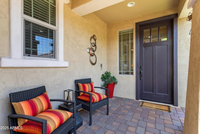 20684 W Meadowbrook Ave, Buckeye, AZ 85396 - entrance to property featuring stucco siding and a patio area