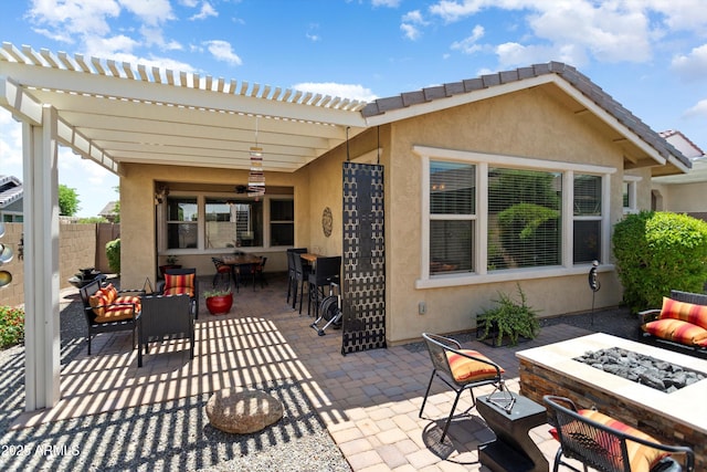 20684 W Meadowbrook Ave, Buckeye, AZ 85396 - view of patio / terrace featuring an outdoor fire pit, a pergola, and outdoor dining area